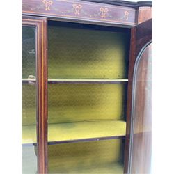Edwardian mahogany display cabinet, shaped front with painted ribbon and bellflower garland decoration, enclosed by two glazed doors, cabriole supports