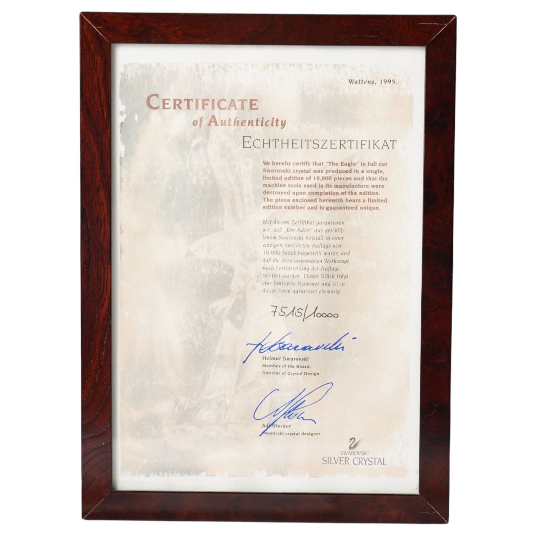 Swarovski, The Eagle, modelled as an eagle in flight upon a wooden base, limited edition 7515/10000, with certificate and case