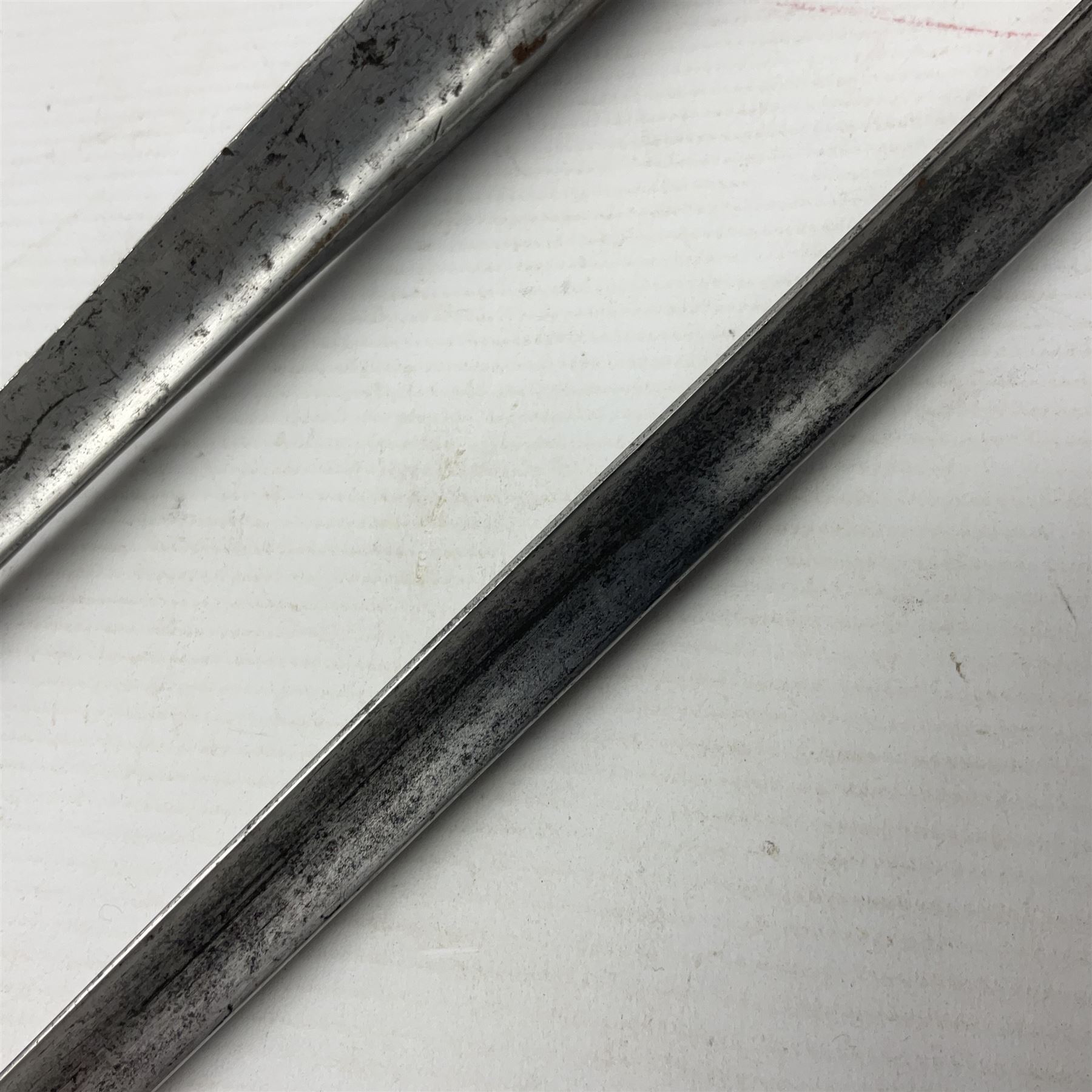 Brown Bess type New Land Pattern socket bayonet L47cm; and a Royal Enfield Pattern 1853 socket bayonet; both lacking scabbard (2)
