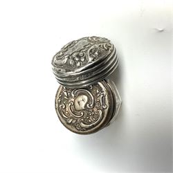 Cased silver handled glove stretcher, button hook, shoe horn, etc., hallmarked Adie & Lovekin Ltd, Chester 1911, and Adie & Lovekin Ltd, Birmingham 1911, miniature silver mounted hymn book, the cover embossed with cherubs, silver handled button hook, ivory handled button hook with silver ferrule, two silver dressing table pot lids, etc. 