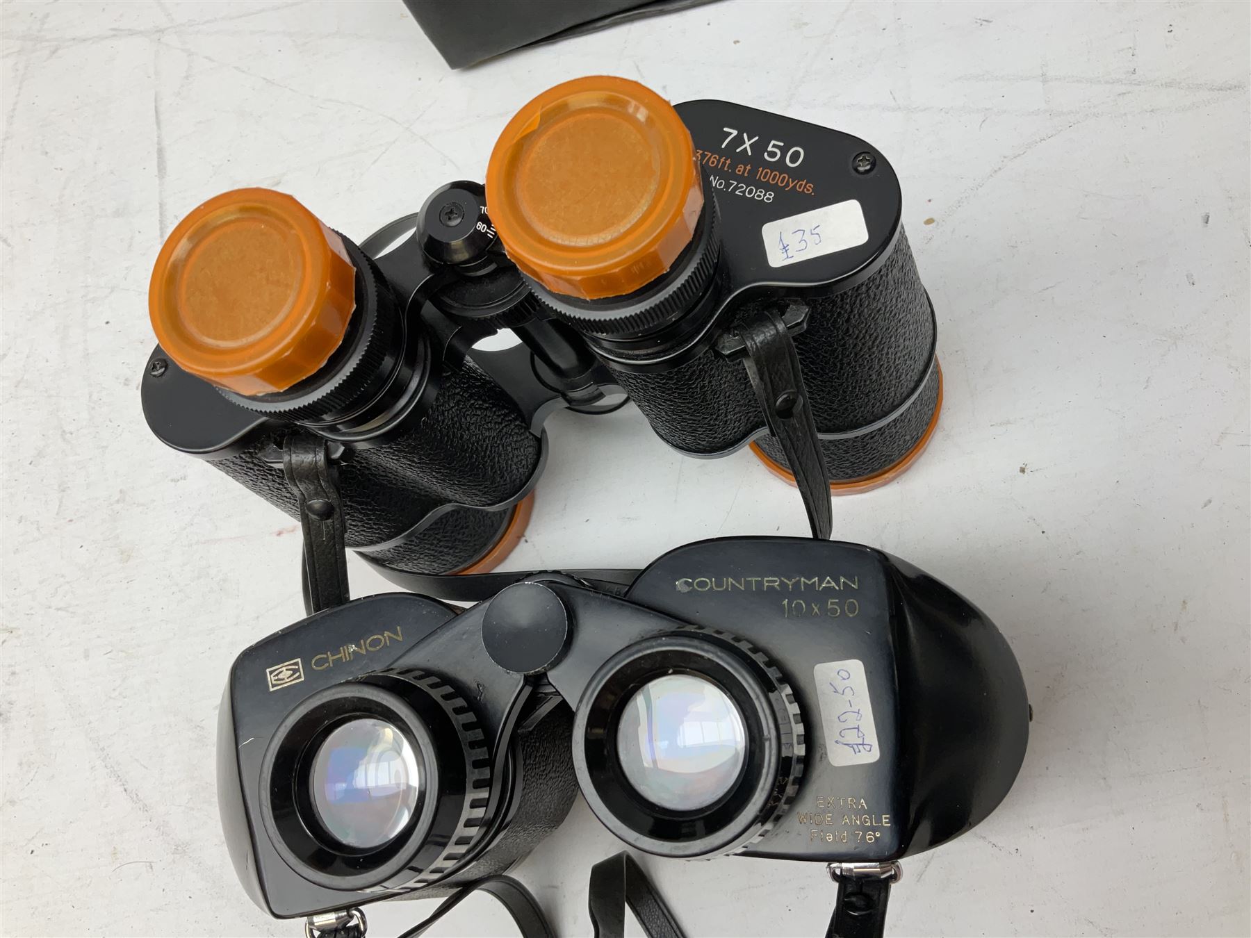 Twelve pairs of binoculars to include BWCF 7x35 Extra Wide Angle, Carl Zeiss Jena Delturis 8x24, Carl Zeiss Jena Jenoptem 8x30W, Chinon Countryman 10x50,  Ajax 8x30, Regent 16x50, etc,  some with cases
