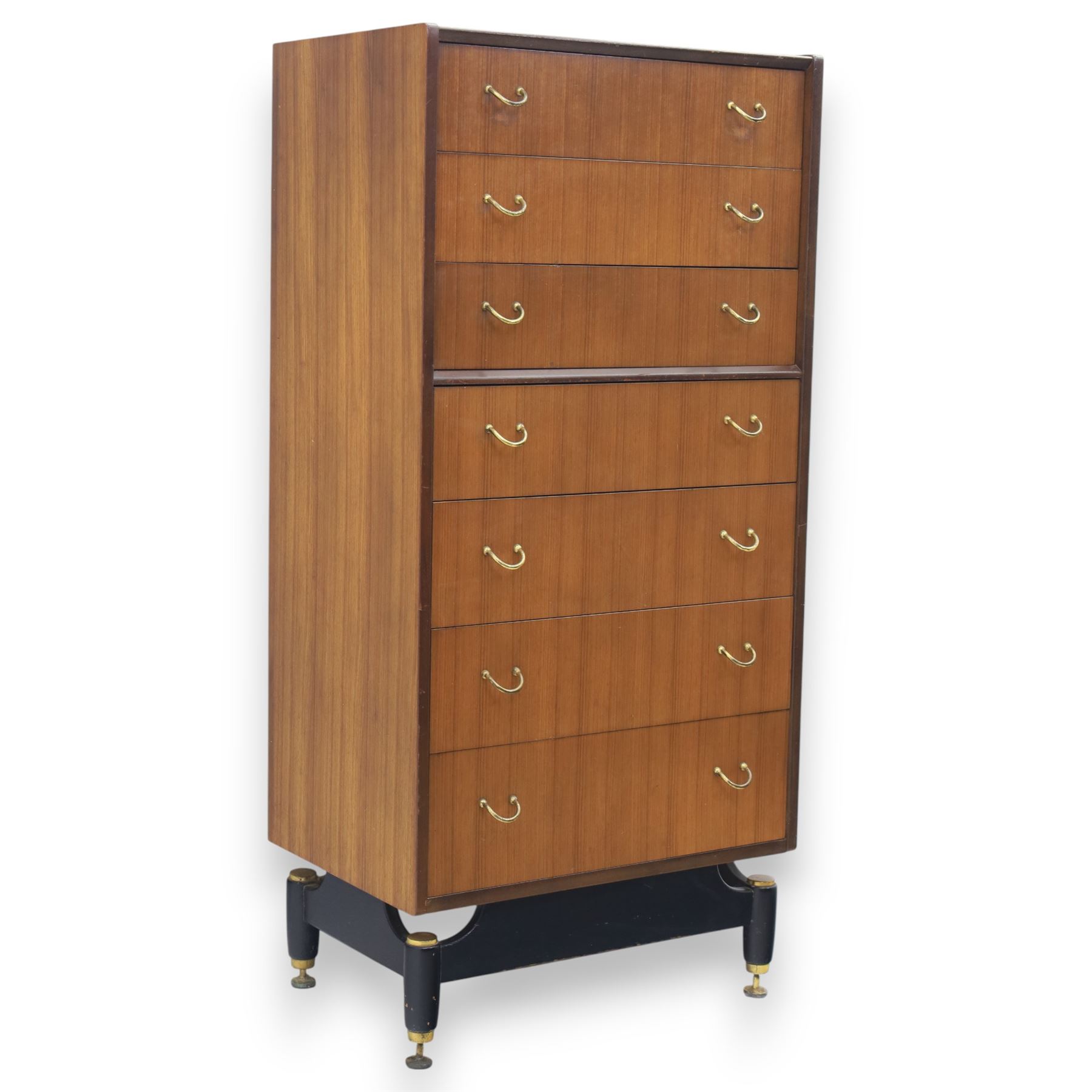 G Plan - 'Librenza' tola wood chest of seven drawers, gold coloured metal pulls on an ebonised based with gold coloured feet