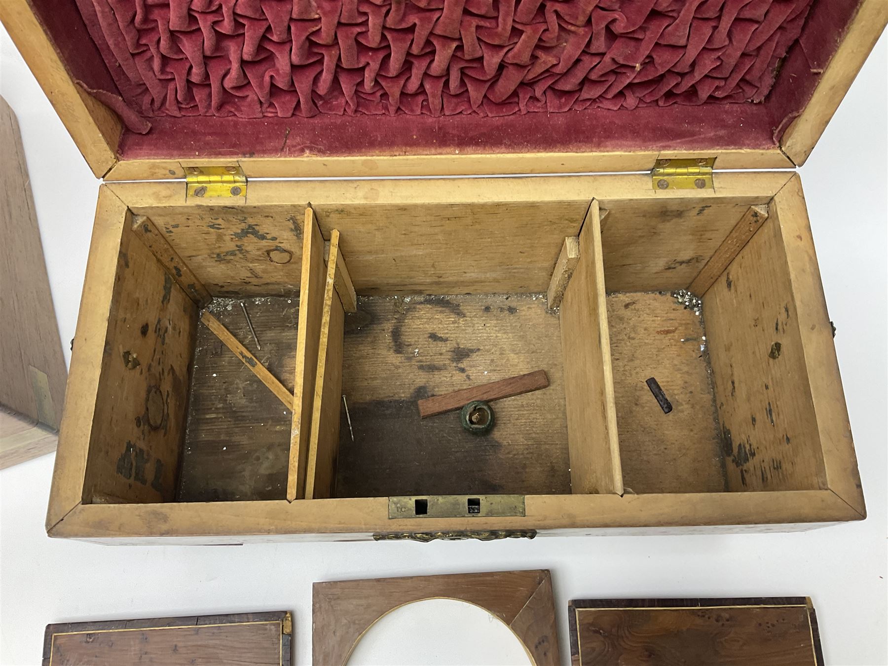 19th century burr yew wood tea caddy, of sarcophagus form, with strung details and brass mounts, the interior split into three compartments, upon four brass bun feet, together with an oak and brass bound writing slope, with red leather interior with gilt detailing, largest H16cm, W40cm