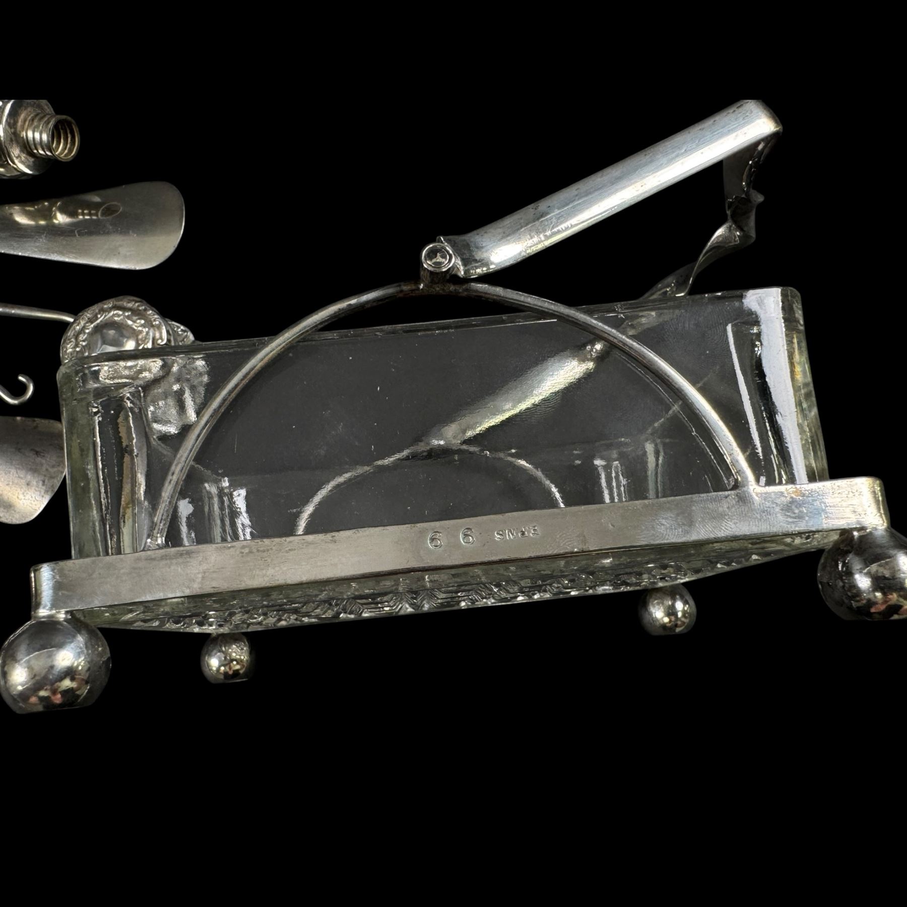 Silver handled button hooks and shoe horns, cut glass jar with silver lid, two silver spoons and an EPNS glass serving dish 