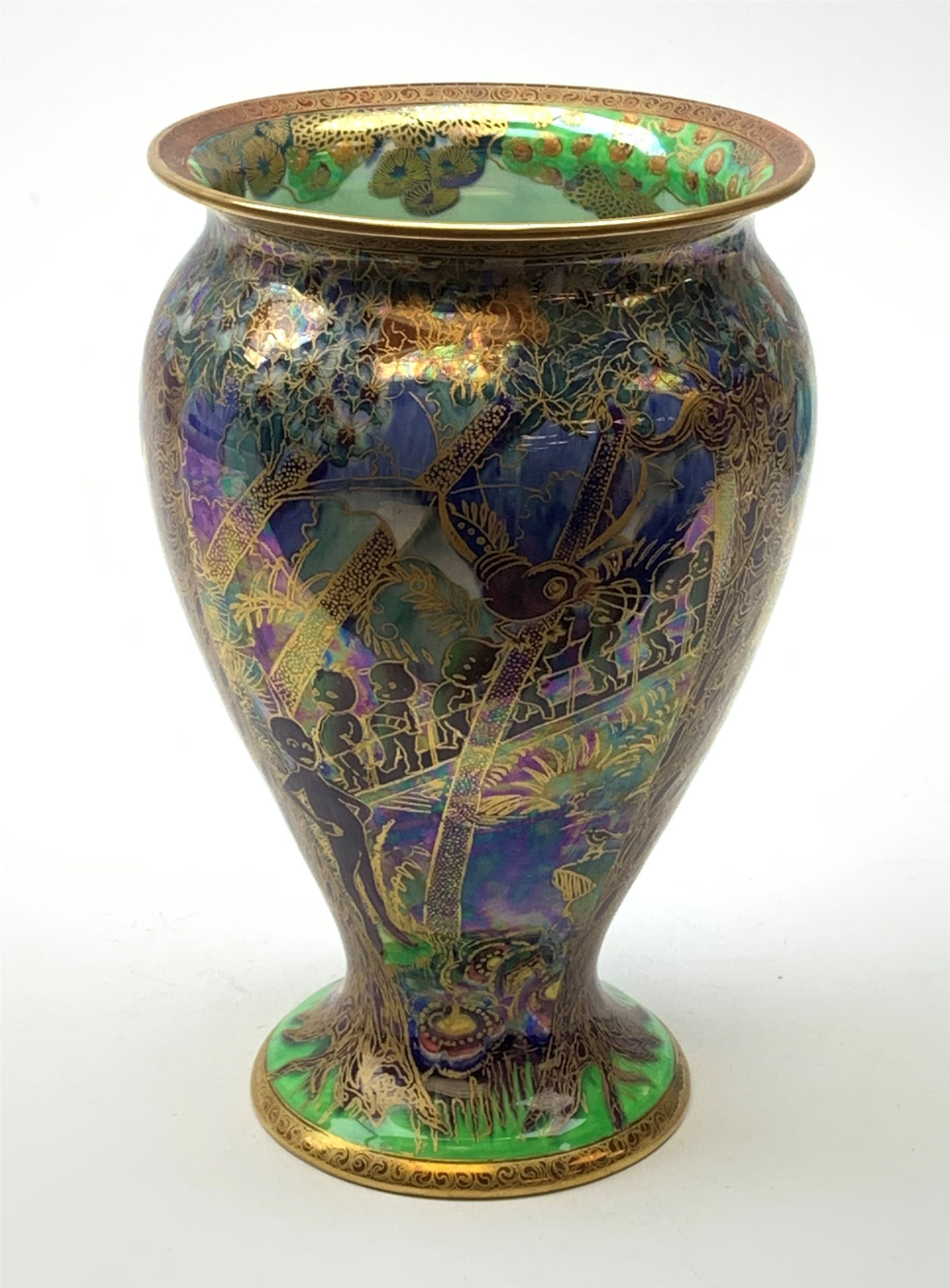 Wedgwood Fairyland Lustre vase, designed by Daisy Makeig Jones, of baluster form decorated with the Imps on a Bridge pattern, painted with a procession of imps crossing a bridge set within a fantasy landscape, heightened with gilt detail throughout, with printed and painted marks beneath, H22.5cm