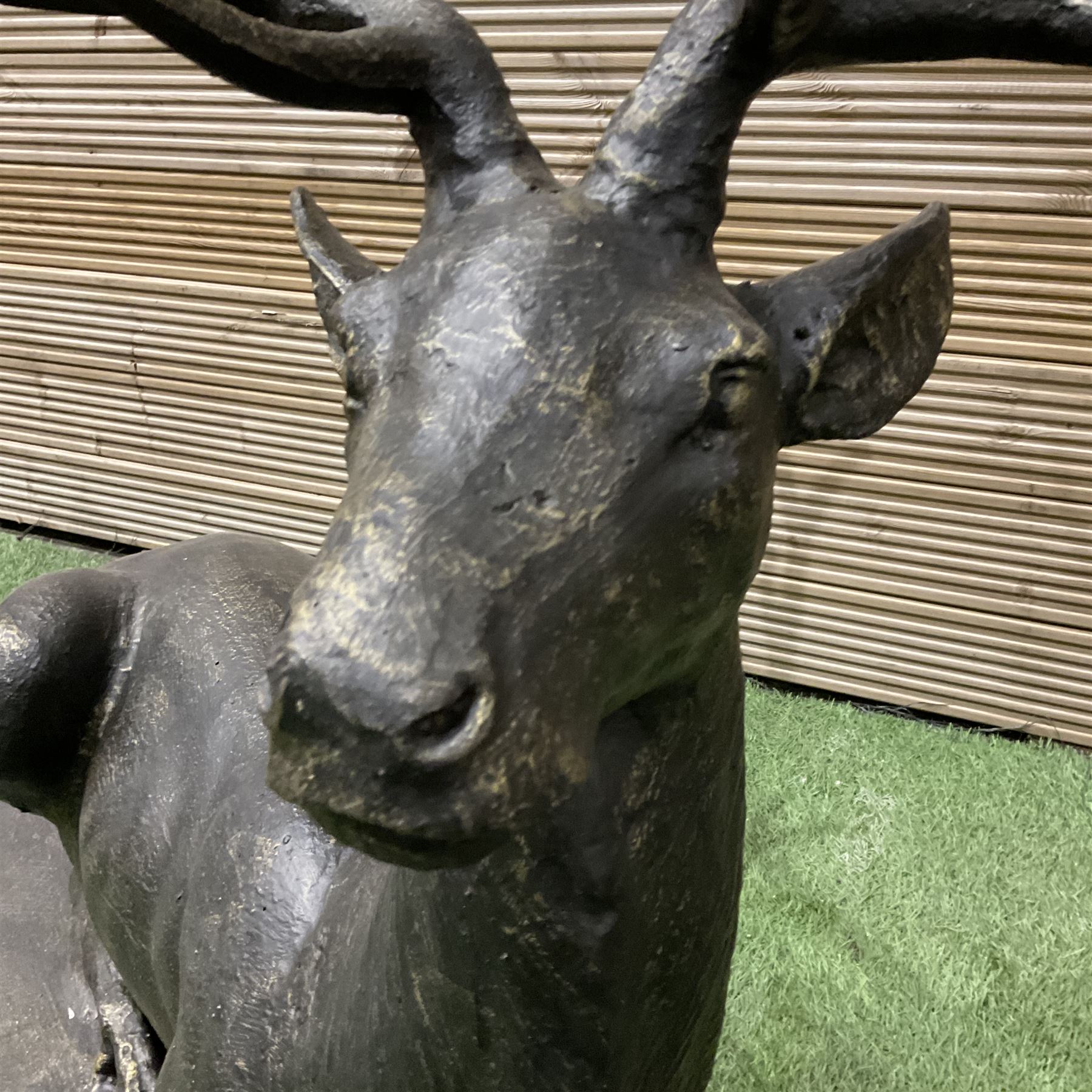 Life size laying stag, cast iron garden figure, on plinth - THIS LOT IS TO BE COLLECTED BY APPOINTMENT FROM DUGGLEBY STORAGE, GREAT HILL, EASTFIELD, SCARBOROUGH, YO11 3TX