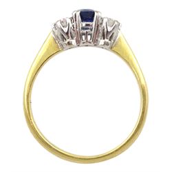 18ct gold three stone round sapphire and diamond ring, London 1988, total diamond weight approx 0.30 carat