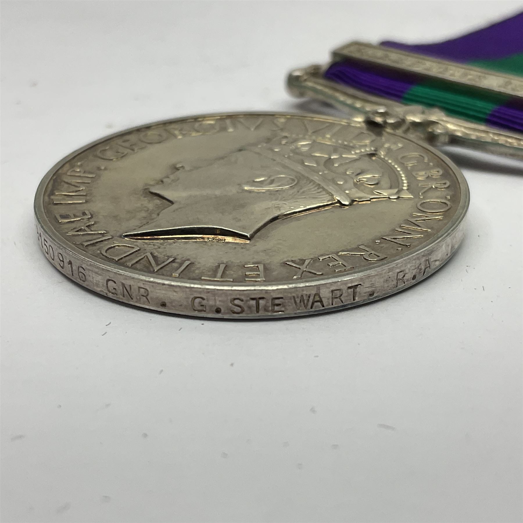 George VI General Service Medal with Palestine 1945-48 clasp awarded to 19150916 Gnr. G. Stewart R.A.; with ribbon