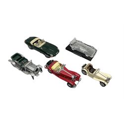 Three Franklin Mint die-cast models comprising 1935 Mercedes 500k Special Roadster, 1938 Jaguar SS-100 and 1907 Rolls Royce The Silver Ghost, together with Hof Bauer glass Lamborghini Countach
model and Bburago Jaguar 1961 'E' type