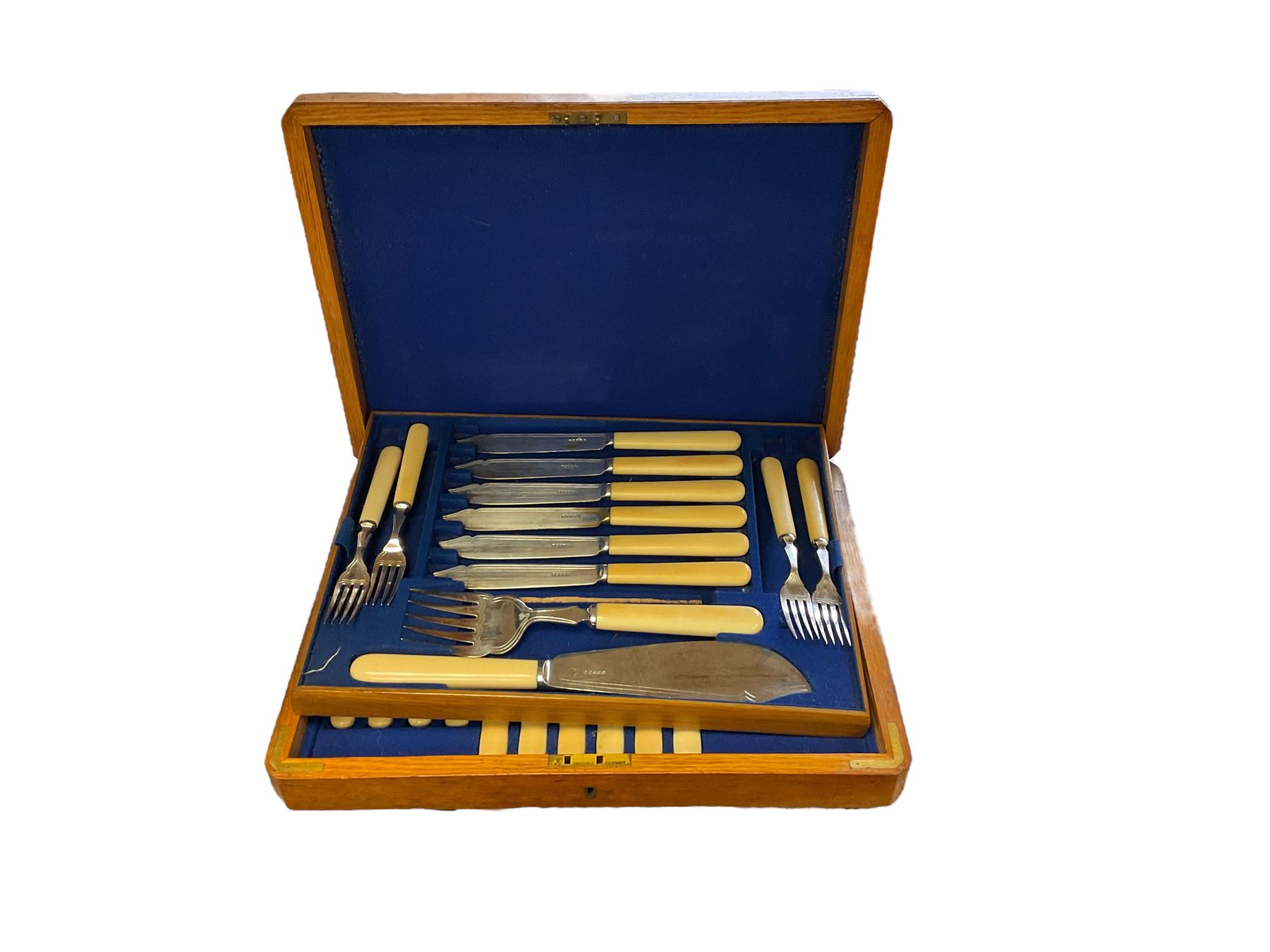 Three cased canteens of cutlery, including a set of fish knives 