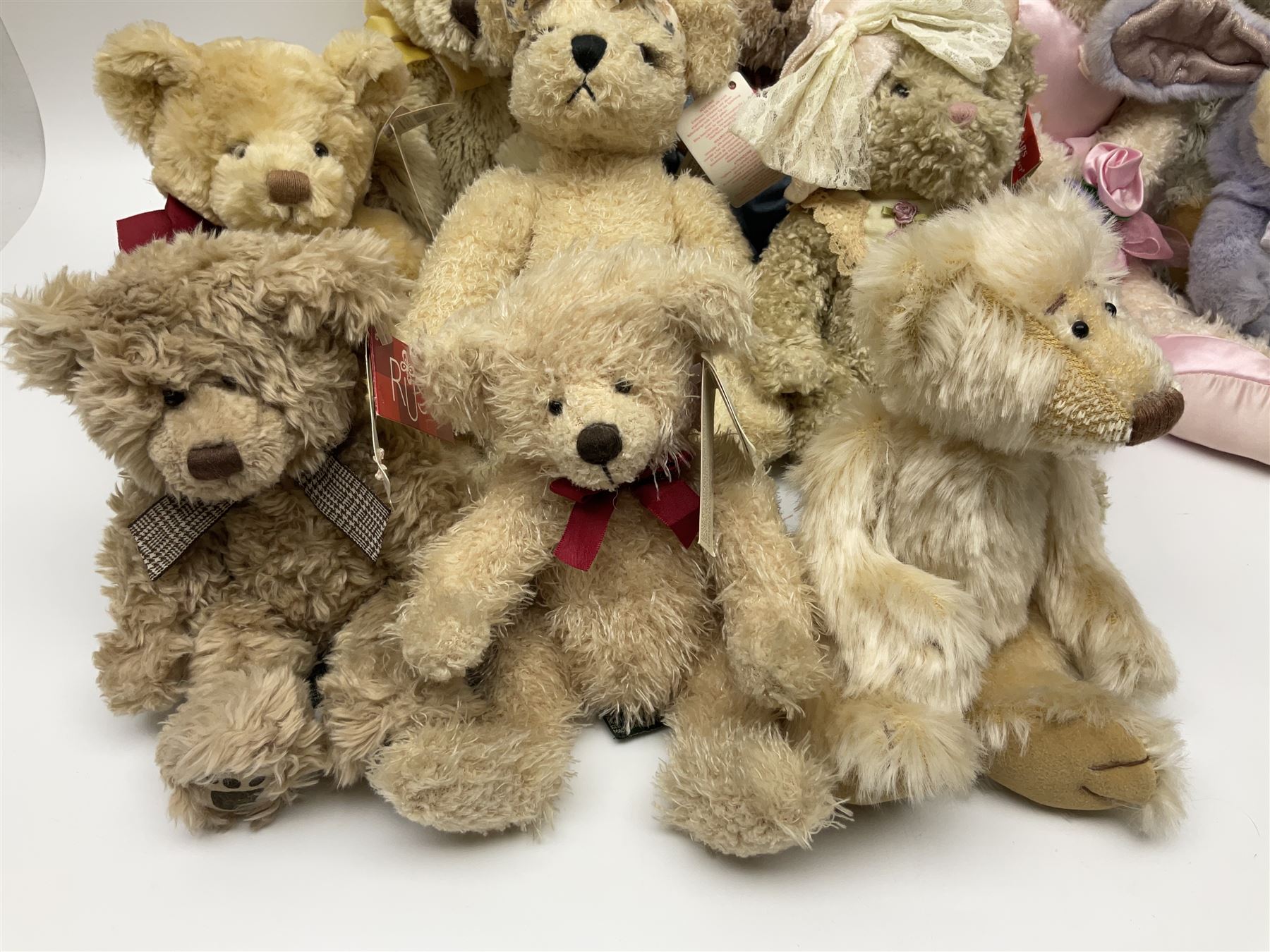 Eighteen Russ teddy bears including Ariella, Chloe, Spencer and Desmond,  mostly with tags, together with six other soft toys, tallest H42cm (24)