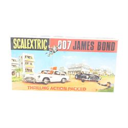 Scalextric James Bond 007 set, comprising two cars; 1967/68 Aston Martin DB5 in white with red interior, ejector seat and machine guns to front with James Bond and villain figure and  007 Mercedes 190SL in black with red interior with driver figure and sniper figure, with two blue controllers, track and instruction booklets, in original box