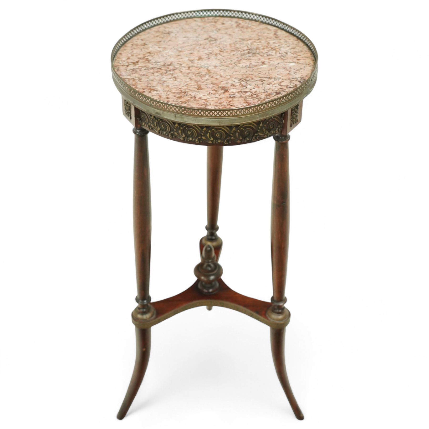 Late 19th century French Empire style mahogany and gilt metal mounted jardinière stand, circular rouge marble top with pierced brass gallery, on three turned supports joined by an undertier stretcher and splayed legs
