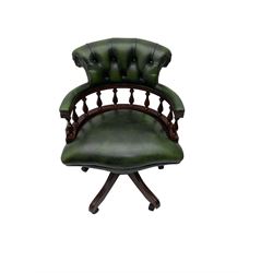 Victorian design captain's swivel desk chair, spindle back supports, upholstered in green buttoned leather