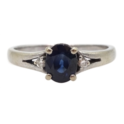 18ct white gold three stone oval sapphire and round brilliant cut diamond ring, stamped 750 