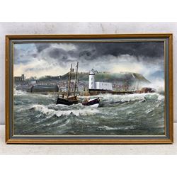Robert Sheader (British 20th century): Scarborough Lifeboat and Fishing Boat SH87 off the Lighthouse, oil on board signed 37cm x 60cm 