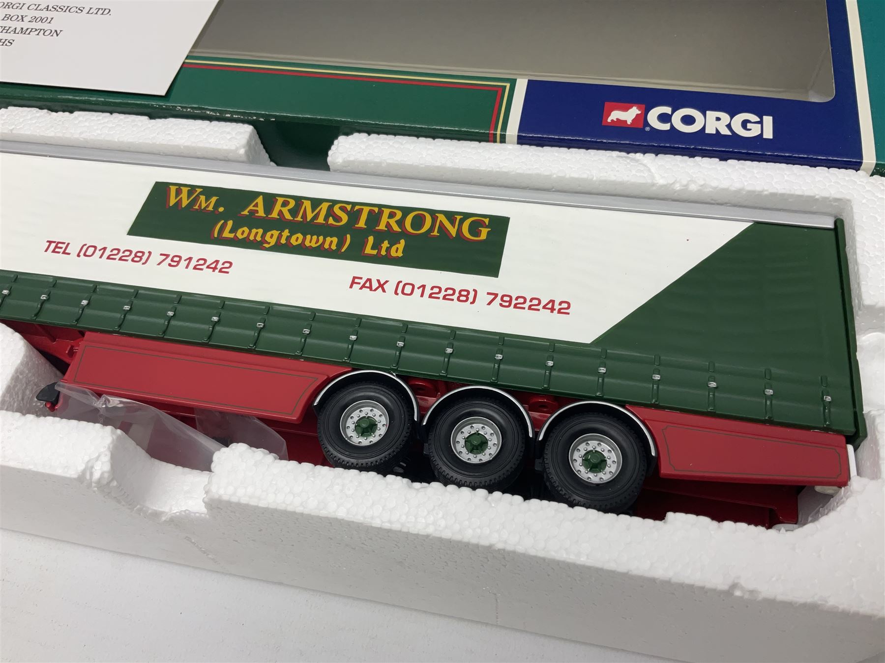 Corgi - three limited edition lorries; CC11905 ERF EC Flatbed Trailer & Log Load Los Millican (Penton) Ltd; CC12102 Renault Premium Curtainside Wm.Armstrong (Longtown) Ltd; and CC12903 Scania Topline Curtainside Currie European Transport; all boxed (3)