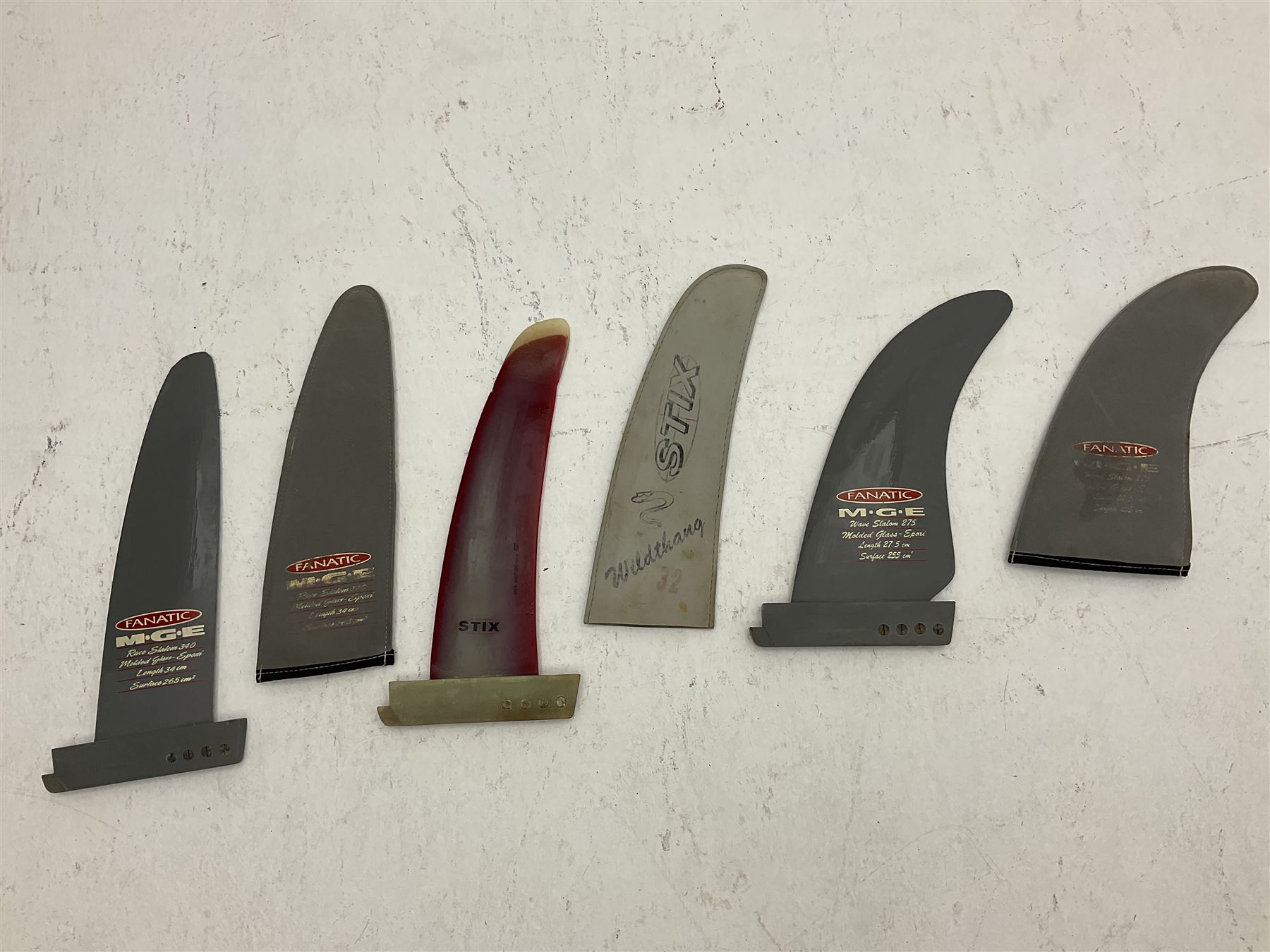 Windsurfing: Quantity of fins to include Freewave MFC, Stix Wildthang, Ultra Profile Sails G 10 fin, F-HOT Finz, Fanatic M.G.E slalom, North Shore Maui Hawaii etc (13)