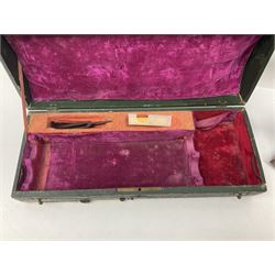 Early 20th century Hawkes and Son simple system hardwood clarinet serial no.1HM257102; cased; and a Swiss Maelzel BS Dulcet metronome of typical pyramid form (2)