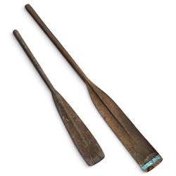 Large early 20th century plank-built wooden river punt, the long tapering hull with enclosed fore and aft decks, open green-painted ribbed interior, together with two paddles