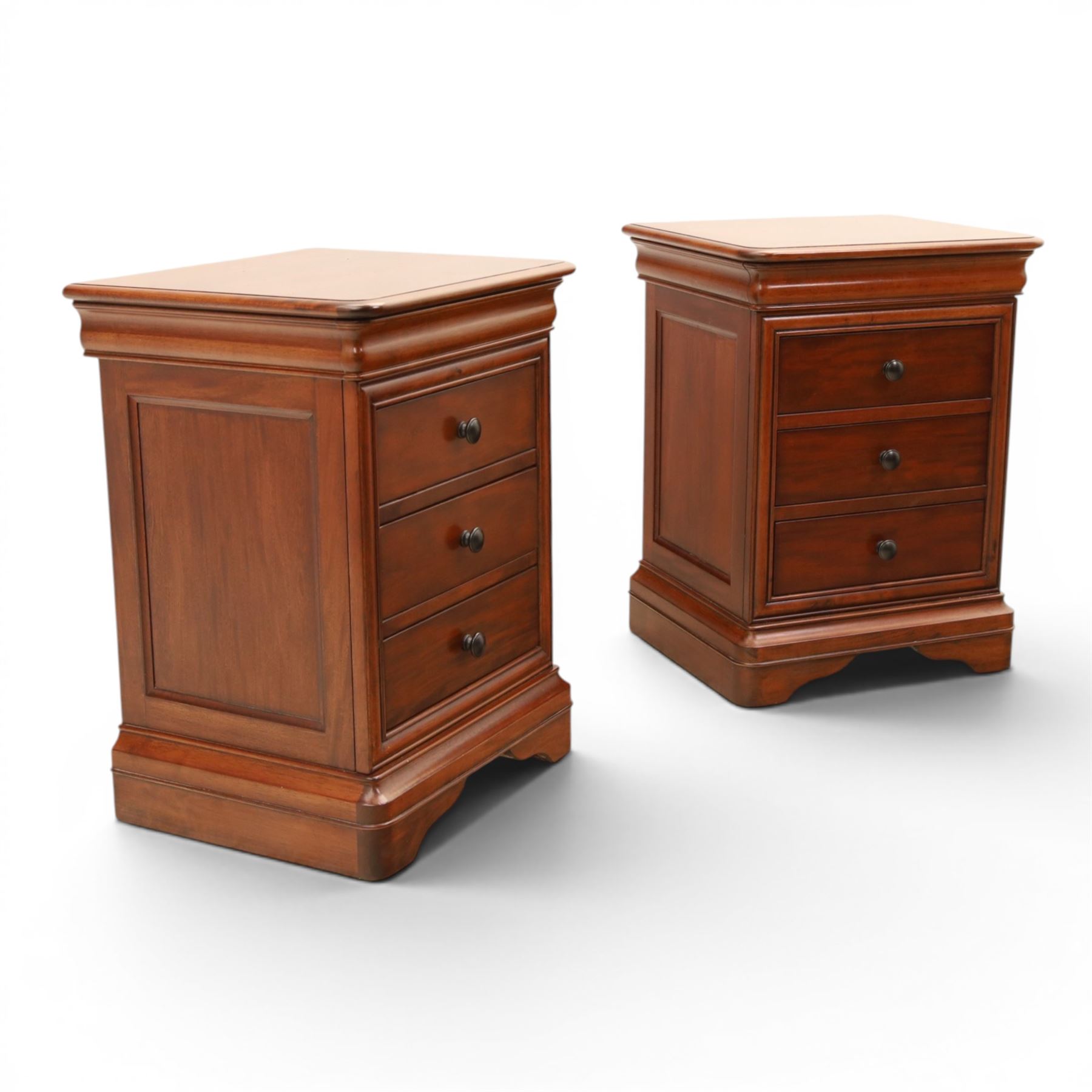Willis & Gambier - mahogany pair of bedside cabinets, with frieze drawer with blue baize lined interior, panelled sides and three drawers raised on bracket feet