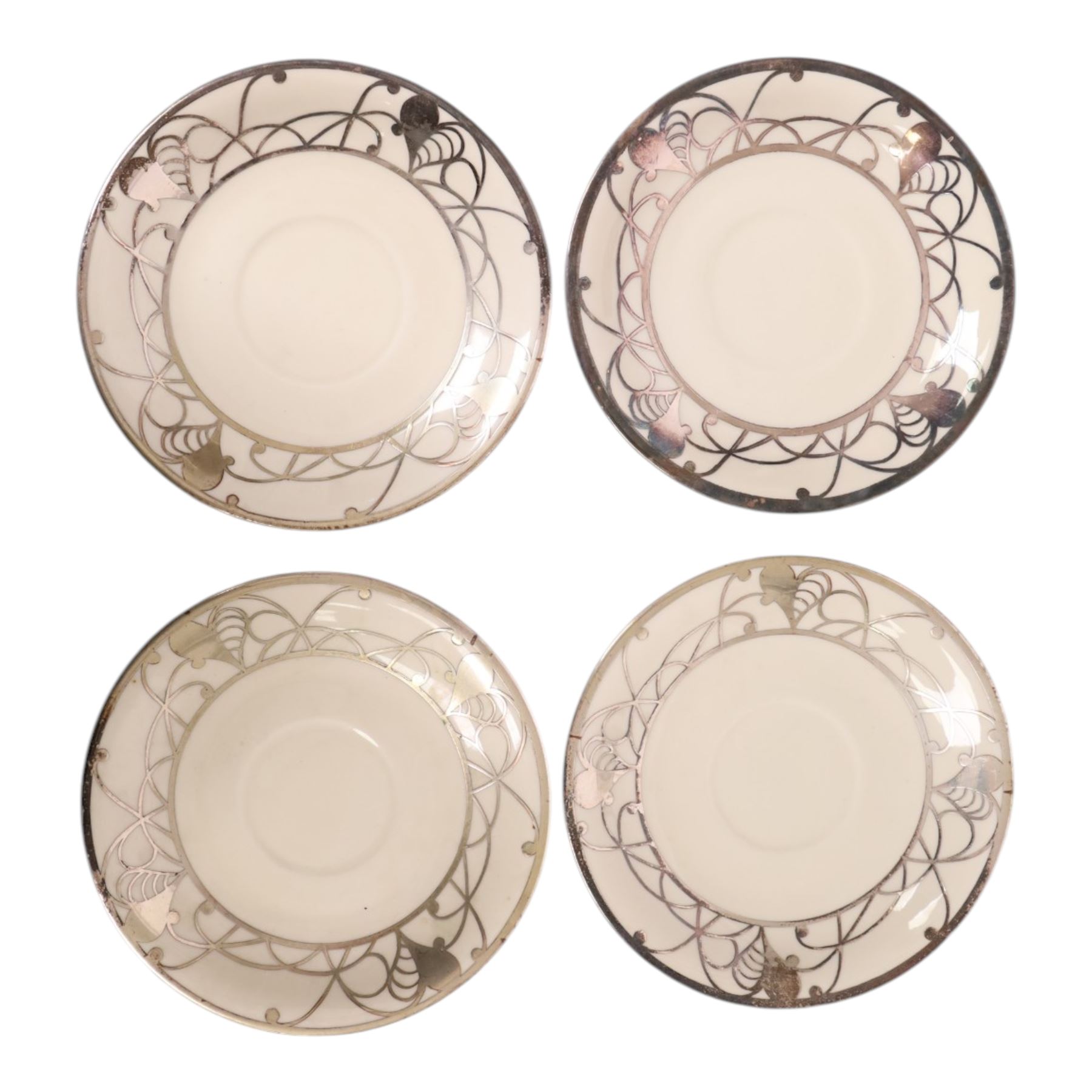 Jacob Hertel Bavarian tea service, decorated with silvered overlay of birds in foliage, comprising teapot, milk jug, covered sucrier three cups and saucers 