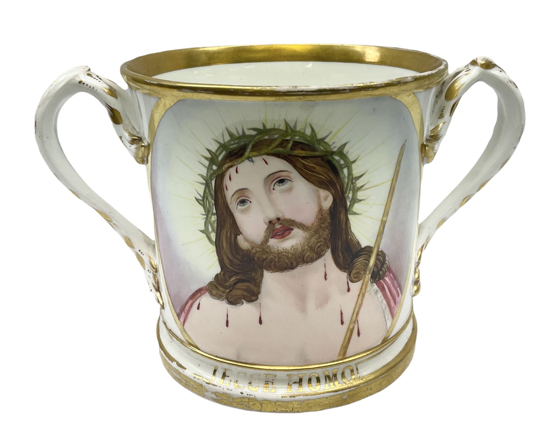 19th century loving cup, with decorated with religious iconography, a gilt rim and writing 'Henry Whittirld Wolverhampton, Whoever drinketh of the water shall thirst again but who soever drinketh of the water that i shall give him shall never thirst',  H14cm
