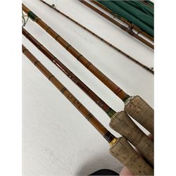 Four split cane fly fishing rods, three made by Burn of Selsdon, the four unmarked, housed in rod bags and a card tube