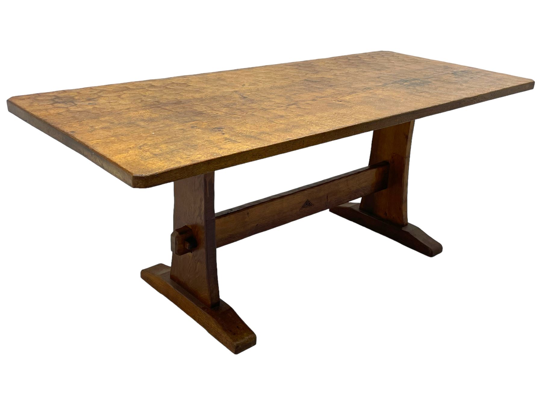 Yorkshire Oak 'Kingpost' - oak dining table, rectangular adzed top on tapered end supports, united by pegged stretchers carved with kingpost signature, on sledge feet, by Robert Ingham, Burton Leonard, Harrogate 