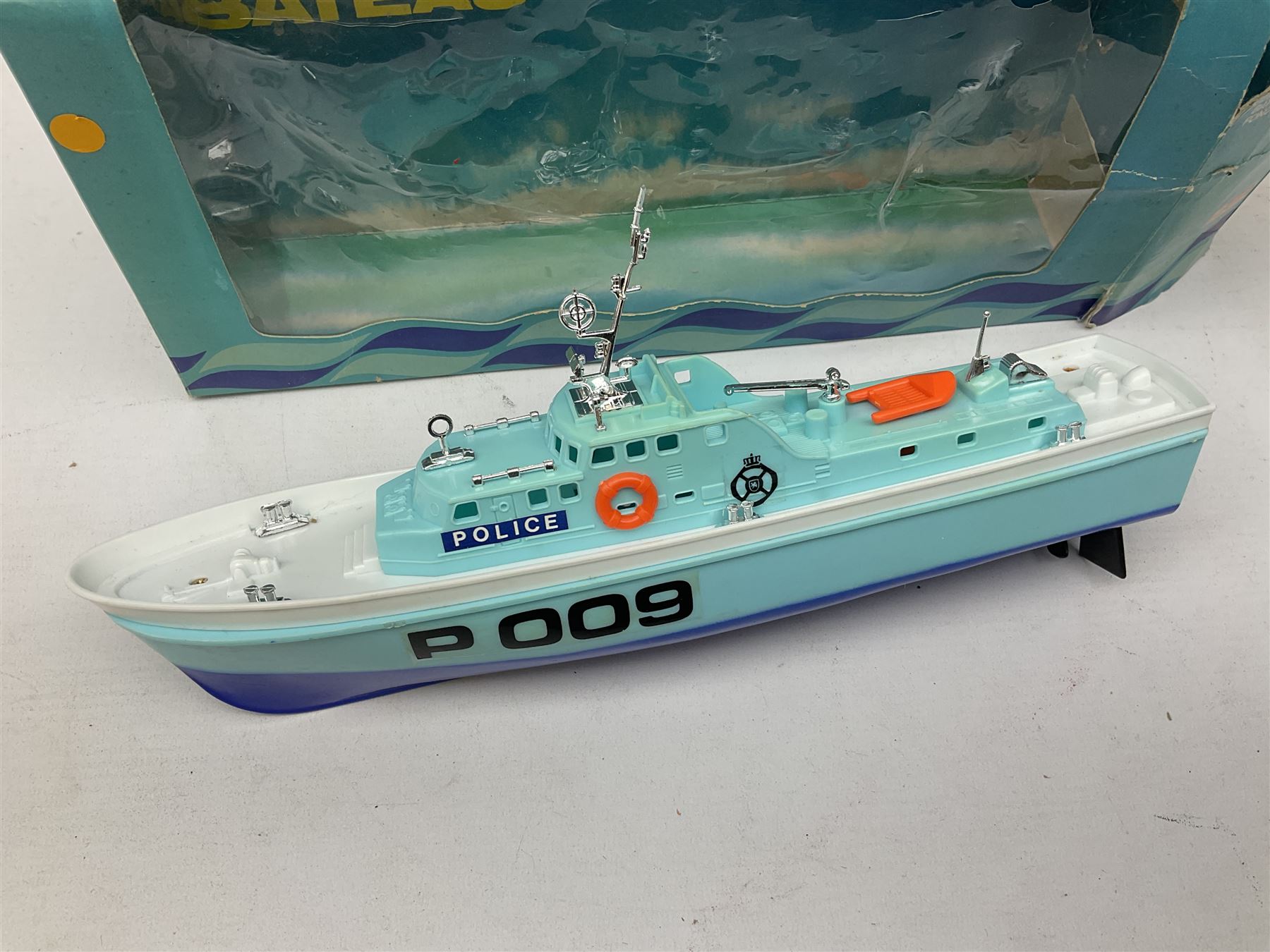 Five model boats - Sutcliffe clockwork Tiger Speedboat; boxed; Motor Sailor battery operated yacht; boxed; Waterline battery operated police launch; boxed; and Tri-ang Scalex 'Aberdeen' North Sea Drifter; boxed, with another similar unboxed (5)