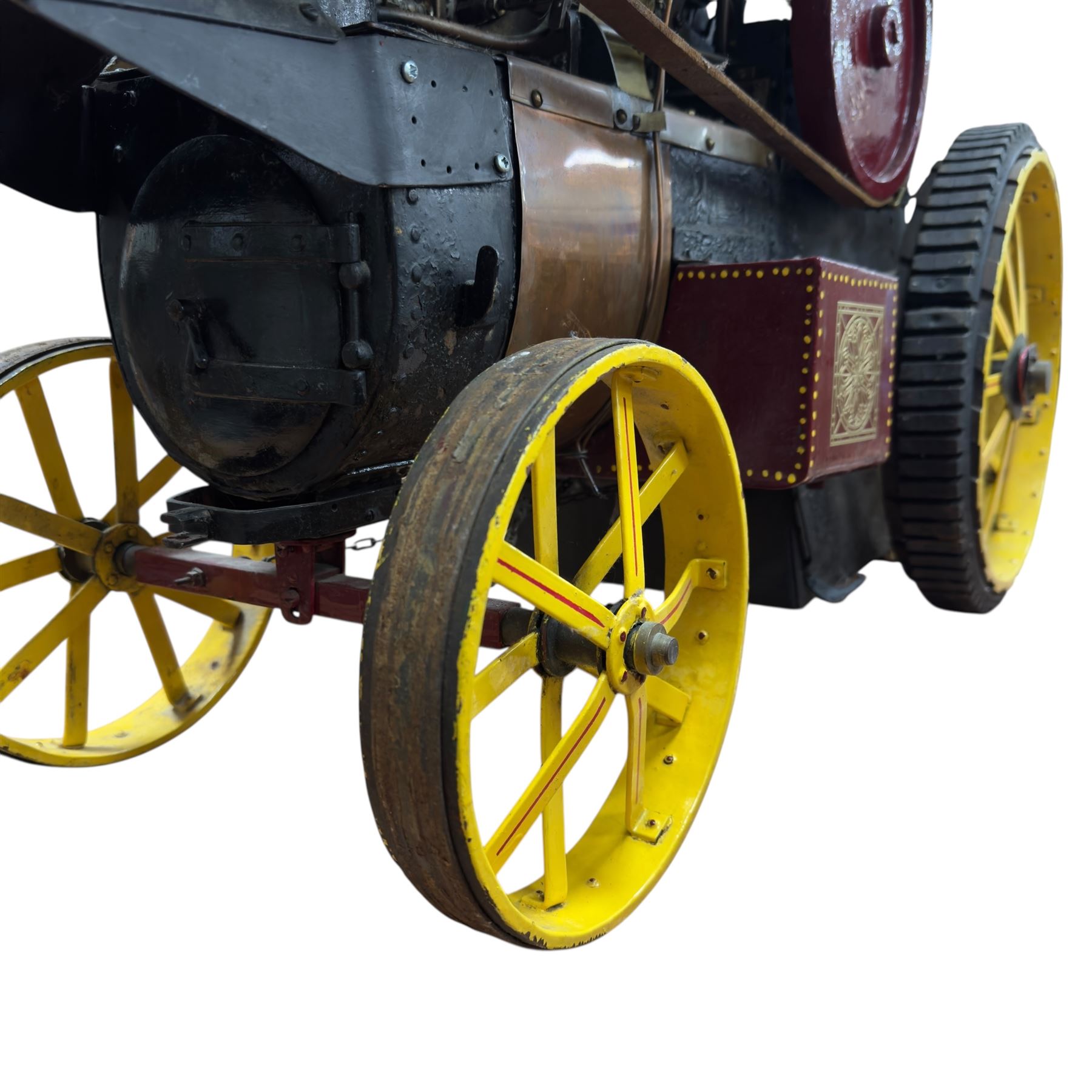 Mid-20th century scratch-built red and yellow painted live-steam scale model of a Showman's Traction Engine, 'Supreme' S.A. Oates & Sons, the simulated full length planked wooden canopy with brass supports and rope edging, with regulator, hand brake, chain steering , dynamo and water feed controls 19cm flywheel, 32cm diameter rear wheels with solid rubber tyres and 21cm diameter front wheels L102cm; together with scratch-built ride-on two-wheel trailer L58cm, and various brass rally plaques for 1980s/1990s.
This is a large, most interesting and comprehensive live-steam working model in need of re-furnishment and some repairs, the boiler has not been tested.