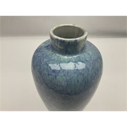 Holyrood Pottery vase of bulbous form decorated in a mottled and streaked green and blue glaze, with printed mark beneath, H24cm