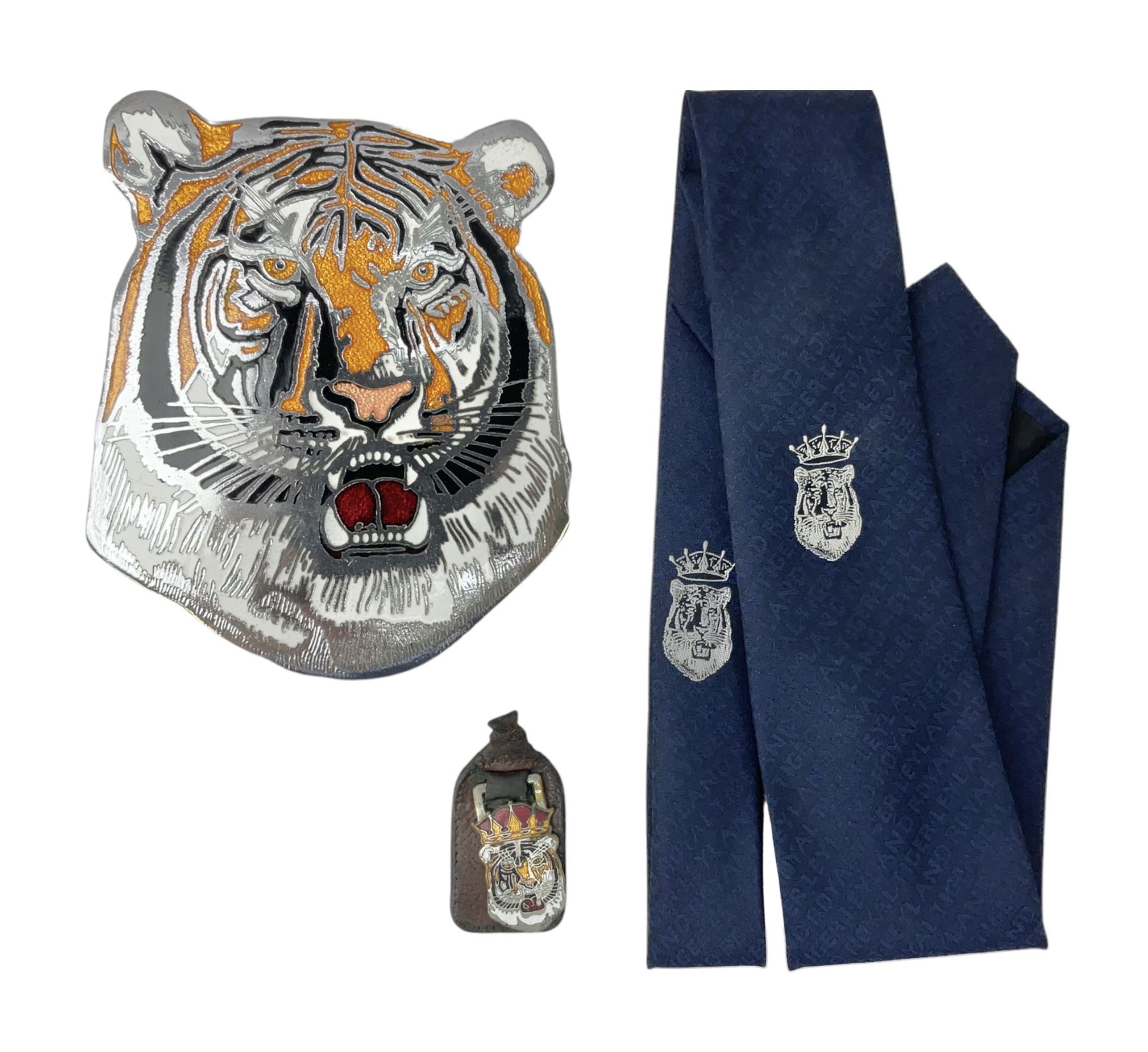 Leyland Royal Tiger enamelled metal sign of a tiger's head marked Manhattan Windsor Birmingham England no. NLH 960 to reverse, L16cm, together with a keyring and Leyland bus navy tie 