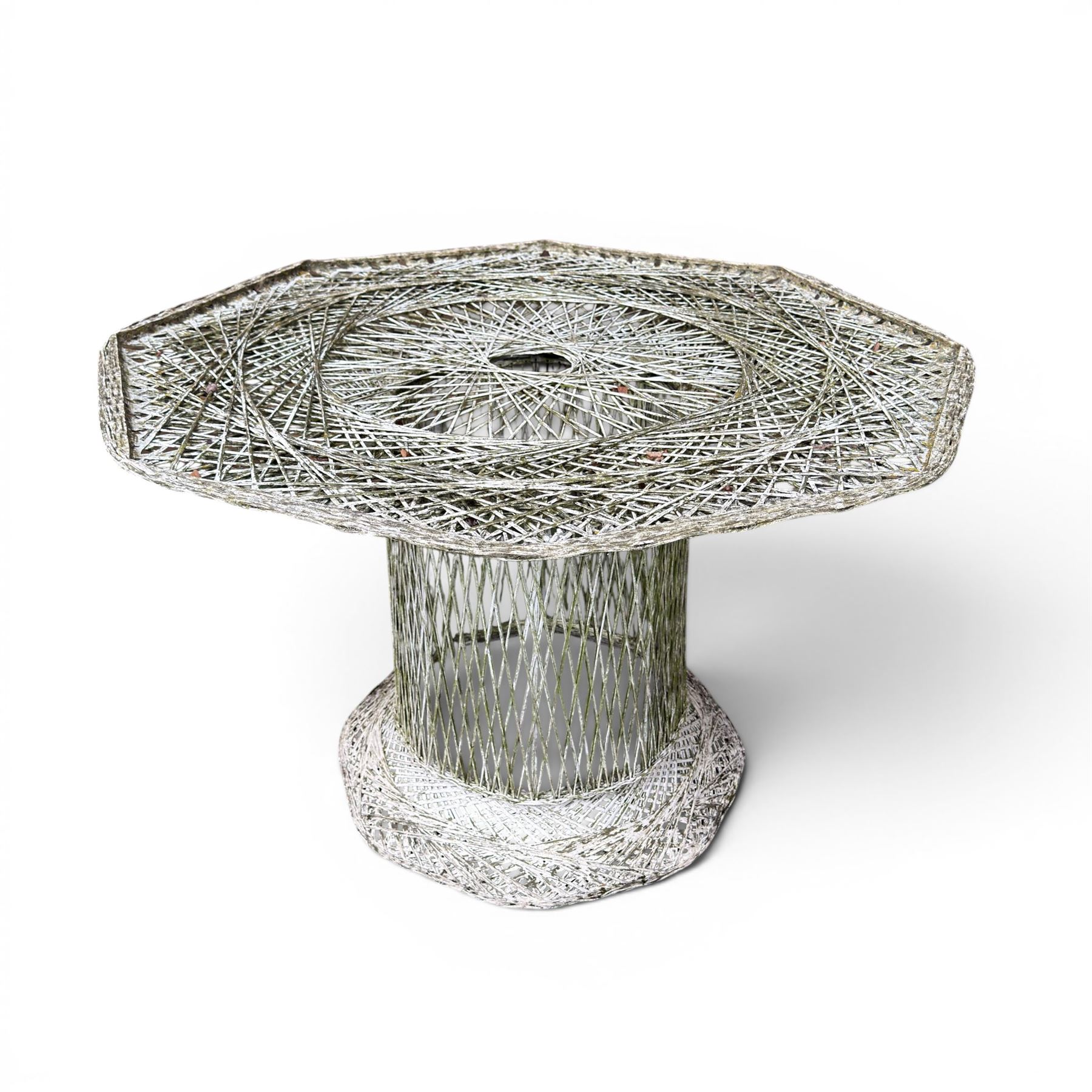 Two French early 20th century painted wicker octagonal garden tables, circular pedestals with parasol opening; with matching side table (3)