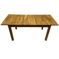 Light oak extending dining table with leaf