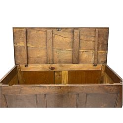 18th century elm mule chest, rectangular lid over triple panelled front, fitted with two short and one long drawer, bracket feet