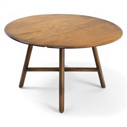 Ercol - elm oval drop leaf table, the oval moulded top with twin hinged leaves, supported on tapering legs with double stretchers (Extends to 124cm)