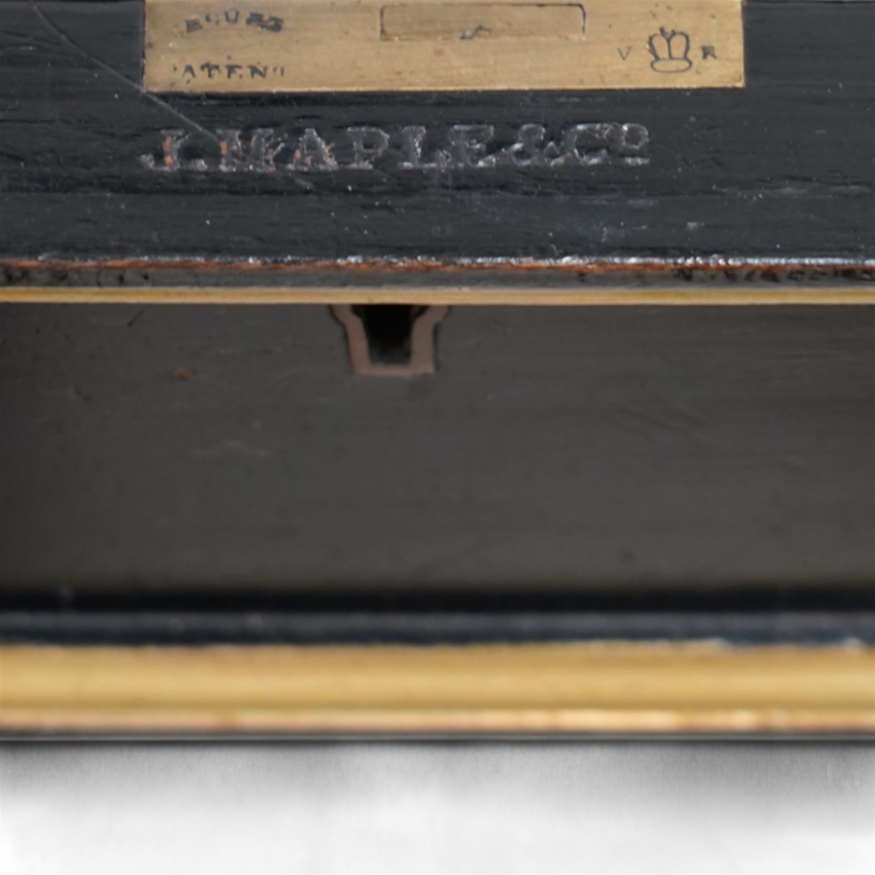 J. Maple & Co. (London: 1841-1988) - Victorian black painted and parcel gilt twin pedestal desk, moulded rectangular top with rounded corners and cream leather writing surface, fitted with nine drawers, on moulded plinth base, stamped 'J. Maple & Son' 