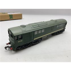 Hornby Dublo - 2-rail - Class 8F 2-8-0 locomotive No.48109 in BR black; Class R1 0-6-0 tank locomotive No.31337 in BR black; and Met-Vic Diesel Co-Bo locomotive No.D5702 in BR green; together with 3-rail Class 4MT Standard Tank 2-6-4 locomotive No.80054 in BR black; three unassociated boxes and one unboxed (4)