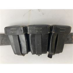 WW2 German 'SS' leather belt with six pouches (one containing unused field bandage) and buckle inscribed 'Meine Ehre Heifst Treue'; belt marked 0/0836 0029