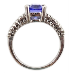  18ct white gold emerald cut tanzanite, with diamond set shoulders, stamped 750   