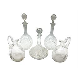 Pair of cut glass decanters and stoppers