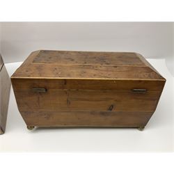 19th century burr yew wood tea caddy, of sarcophagus form, with strung details and brass mounts, the interior split into three compartments, upon four brass bun feet, together with an oak and brass bound writing slope, with red leather interior with gilt detailing, largest H16cm, W40cm