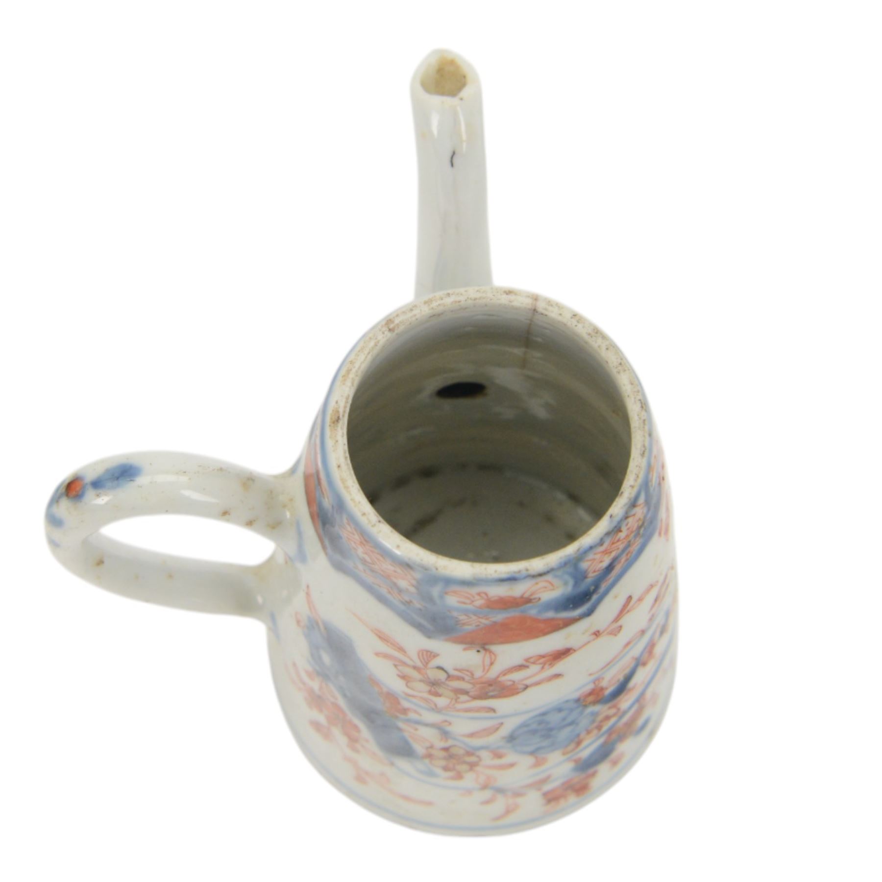 18th century Chinese Imari coffee or chocolate pot, of tapering cylindrical form with side handle, and domed cover with knop finial, painted with a vase of flowers upon a table and scroll, amongst blossoming flowers, H12cm 