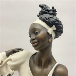 Giuseppe Armani Florence figure, Black Maternity, modelled as a mother and child upon a stylised cloud and mahogany base, H32cm