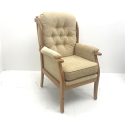 Beevers beech framed high seat armchair, upholstered in a seep buttoned beige fabric, W68cm