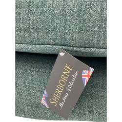 Sherborne England Lyndon fireside armchair, upholstered in Highland Baltic fabric, light oak legs