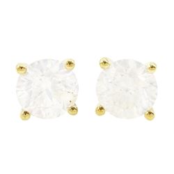 Pair of 18ct gold diamond earrings, each stud set with a single round brilliant cut diamon...