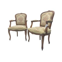 Pair French Louis XV design beech framed salon armchairs, upholstered in tapestry style fabric with sprung seat and studwork border, on cabriole supports