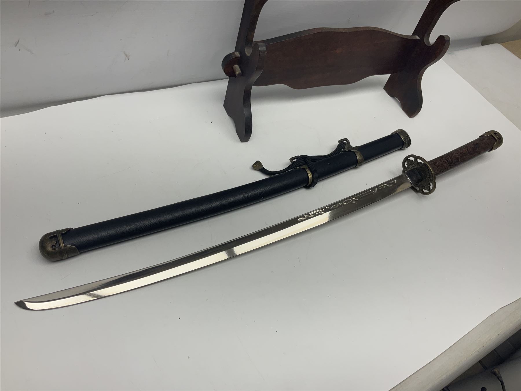 Modern sword set and wall clock